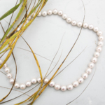 Elegant pearl necklace with golden clasp