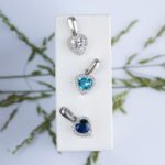 Cute silver pendant with various color heart crystals