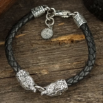 Exclusive silver bracelet "Wolves" on leather cord